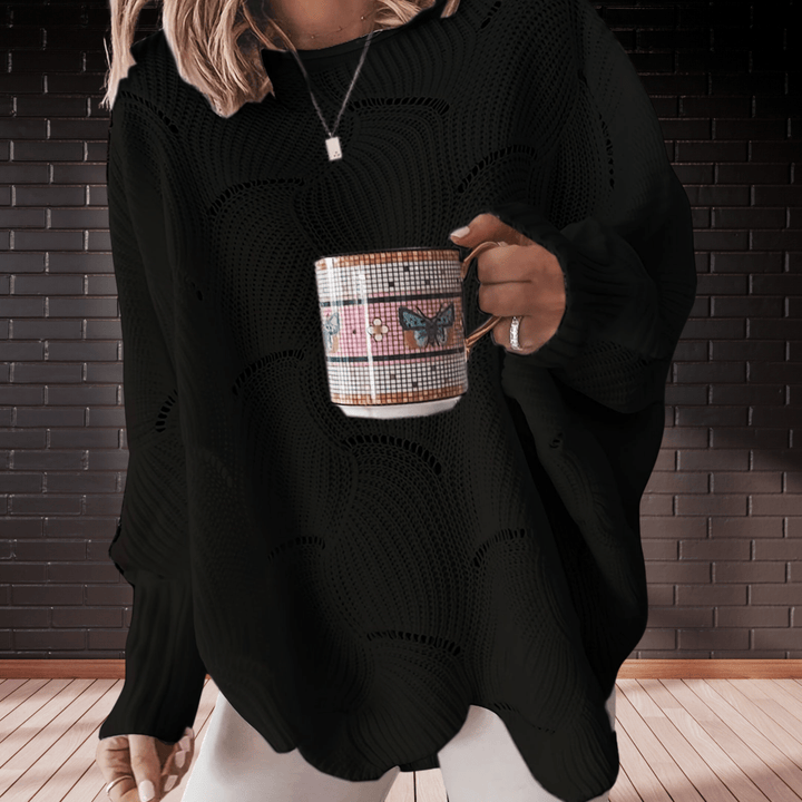 Cozy women's ribbed knit autumn jumper. Casual chic long-sleeve sweater with a stylish asymmetric hem for fall.