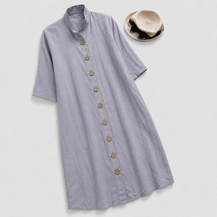 Women's casual shirt dress: button-down style, layered midi hem. A versatile and chic all-season dress.