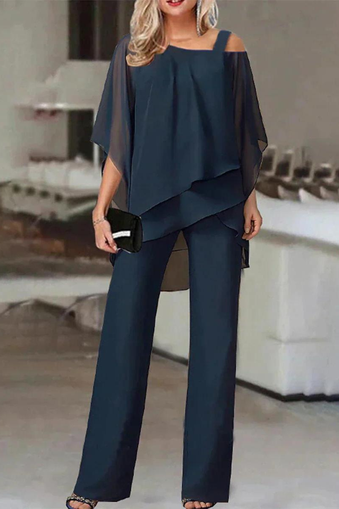 Chic women's comfortable blouse and pants two-piece set for versatile casual or office wear. Elegant matching outfit.