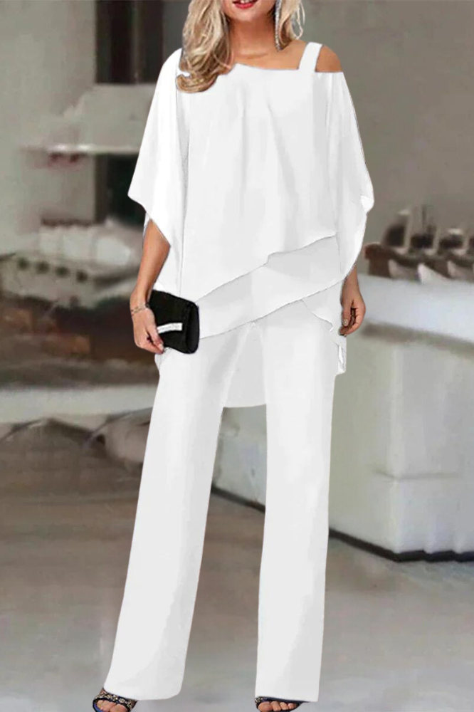 Versatile women's two-piece blouse & pants set. Chic, comfortable coordinated outfit for casual or work style.