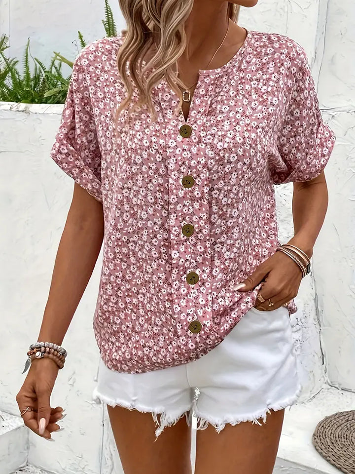 Women's versatile floral print blouse for office or casual chic style. Elegant, comfortable summer top.