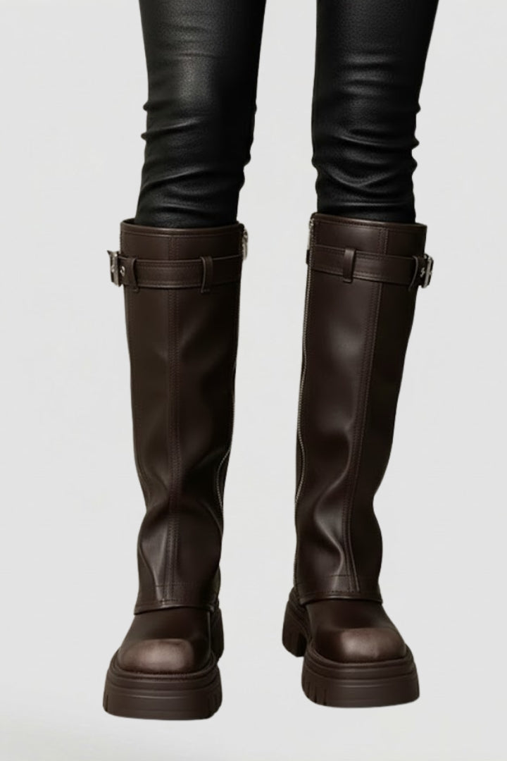 Elegant black knee-high platform boots for women, featuring a stylish design and comfortable fit.