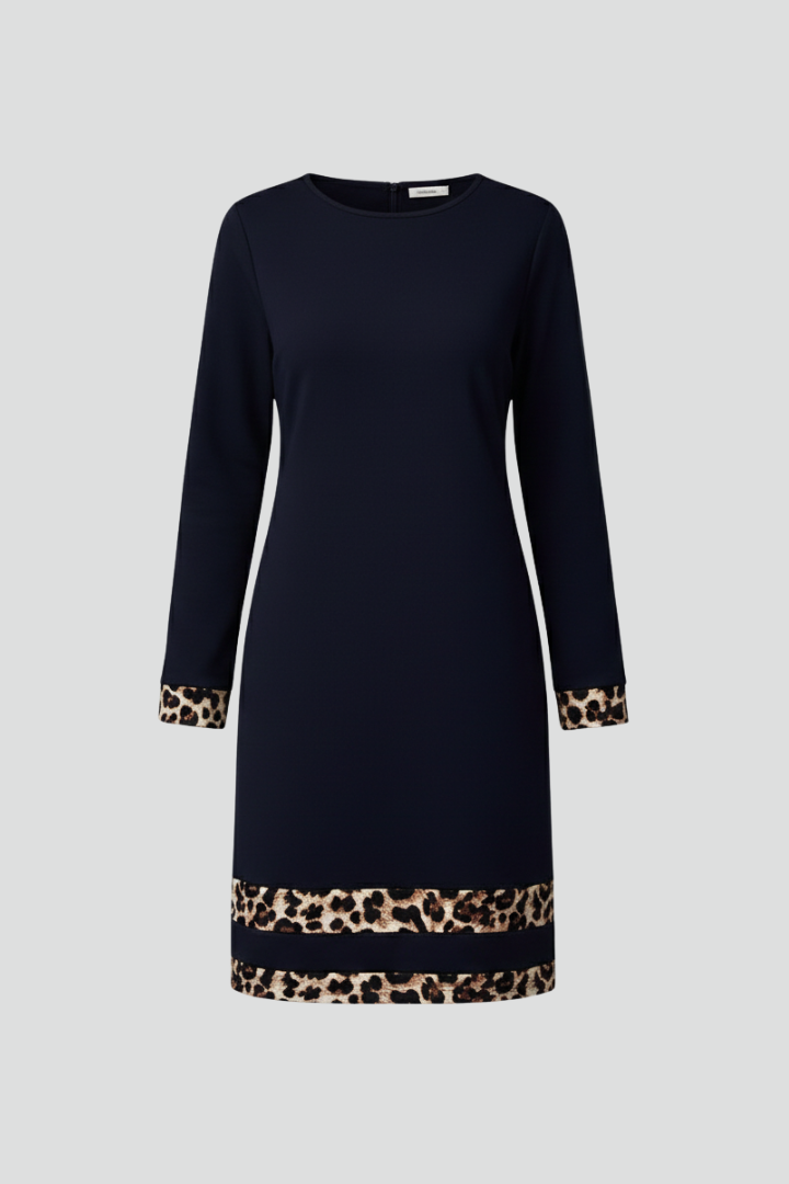 Chic women's long sleeve mini dress with a round neck and stylish patterned hem, perfect for casual or elegant wear.