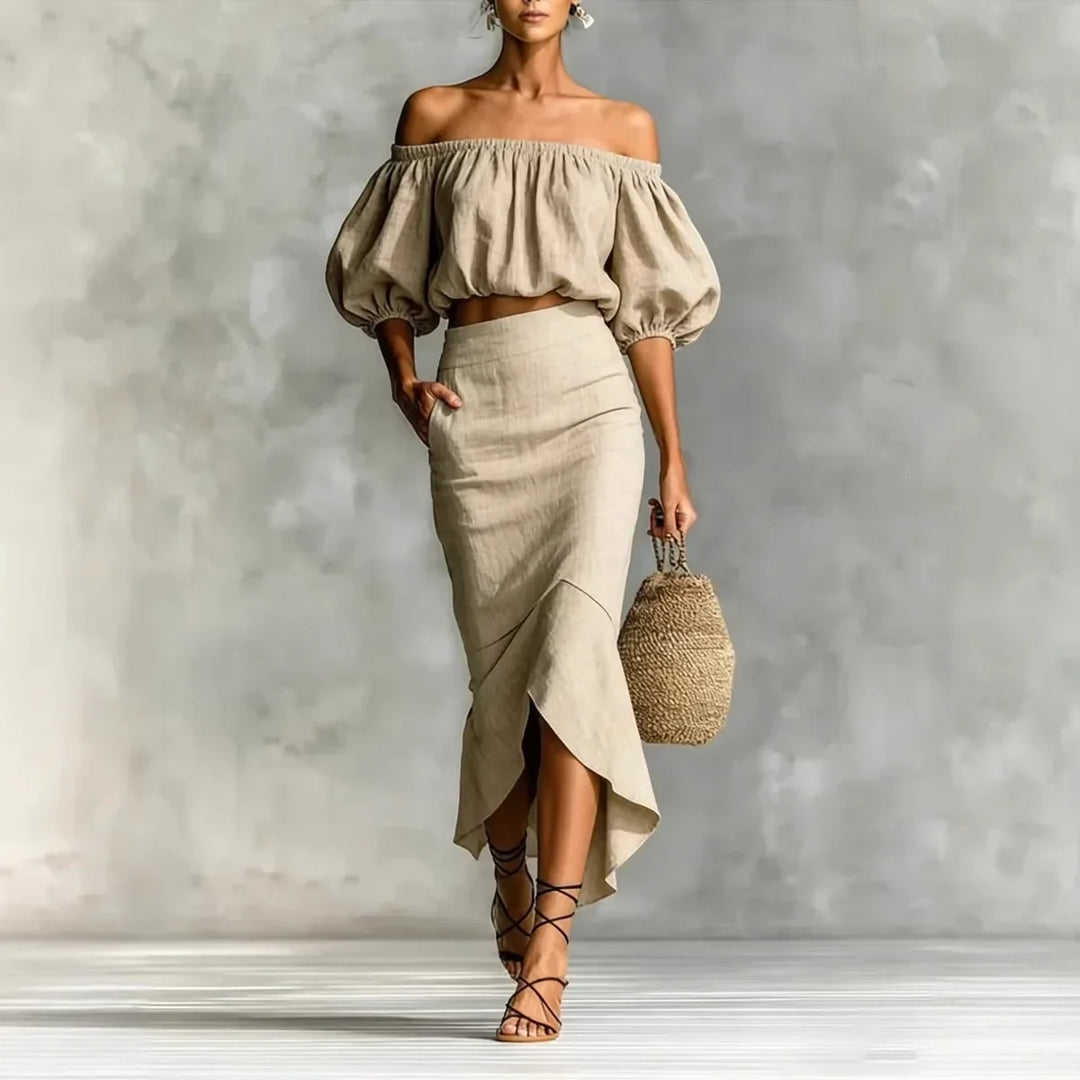 Chic women's off-shoulder skirt set with elegant puff sleeves & flattering wrap midi skirt, perfect for summer vacation.