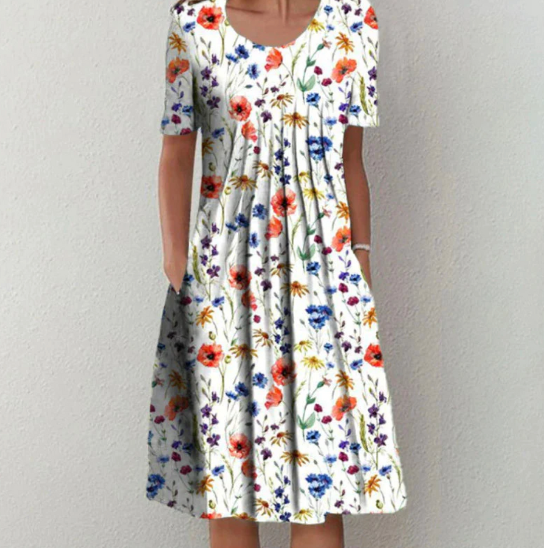 Chic women's printed A-line midi summer dress with pleats, perfect for casual wear or vacation.