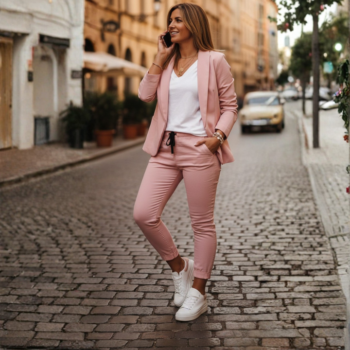 Chic women's ruched sleeve blazer & jogger set for smart casual style. Stylish two-piece outfit.