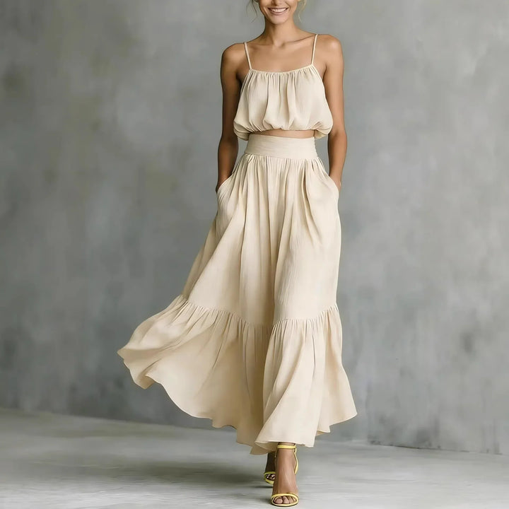 Women's summer two-piece set: ruffle hem crop top with spaghetti straps & matching flowy maxi skirt.