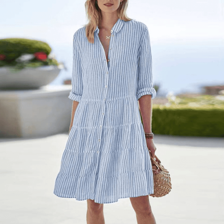 Chic women's striped summer mini dress, perfect for casual wear, beach days, or vacation outfits. Flowy & comfortable.