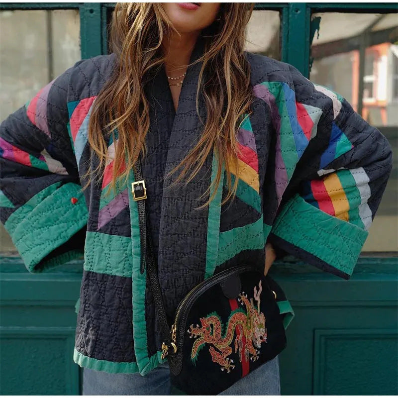 Relaxed fit women's vintage flair long sleeve knit jacket. Ideal cozy outerwear for chic autumn & winter fashion.