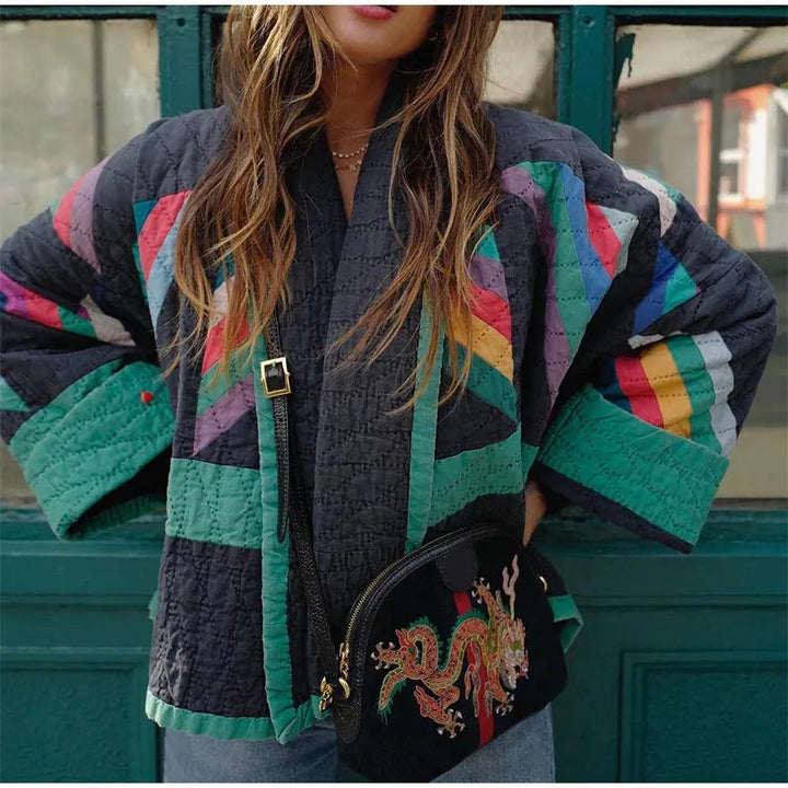 Relaxed fit women's vintage flair long sleeve knit jacket. Ideal cozy outerwear for chic autumn & winter fashion.