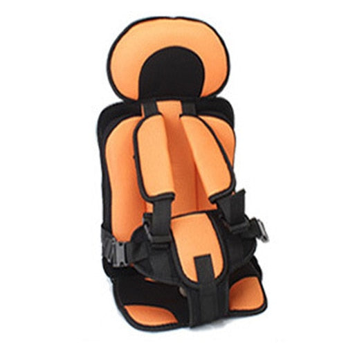 Comfortable child booster car seat featuring a washable cover & safety harness for easy cleaning & travel.