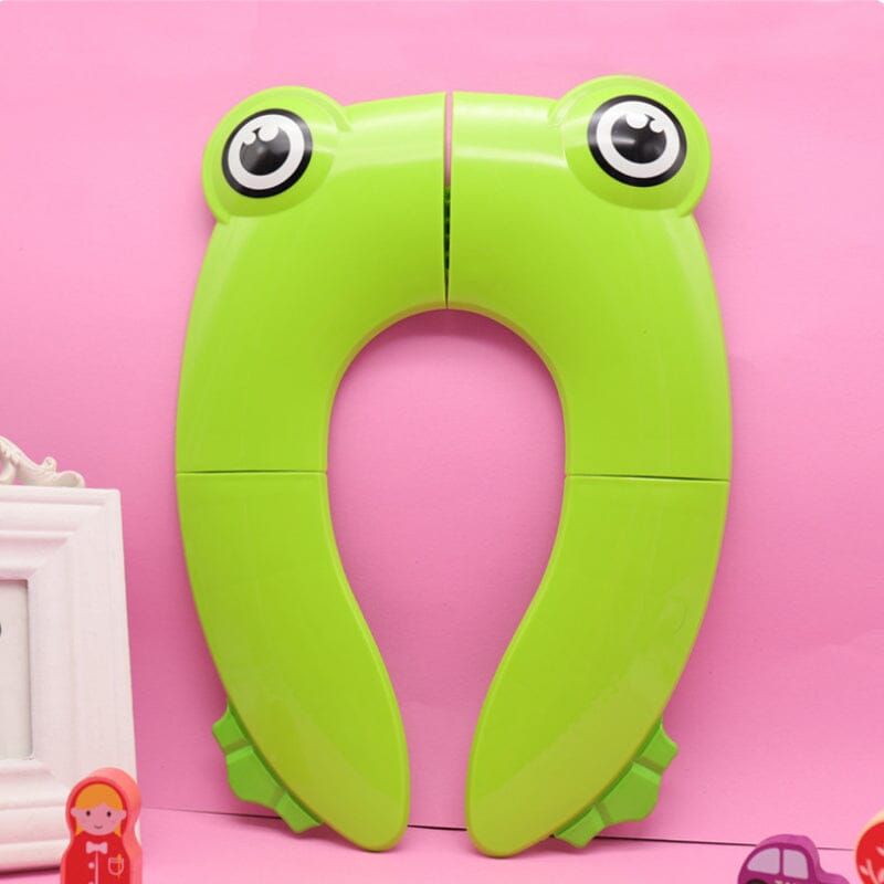 Pink children's folding portable potty seat, unfolded, ready for use, travel toilet seat for kids