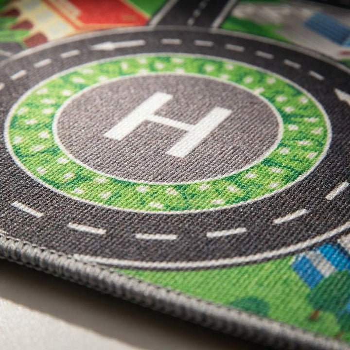 Durable children's city play mat area rug, ideal for indoor imaginative play with toy cars and figures.