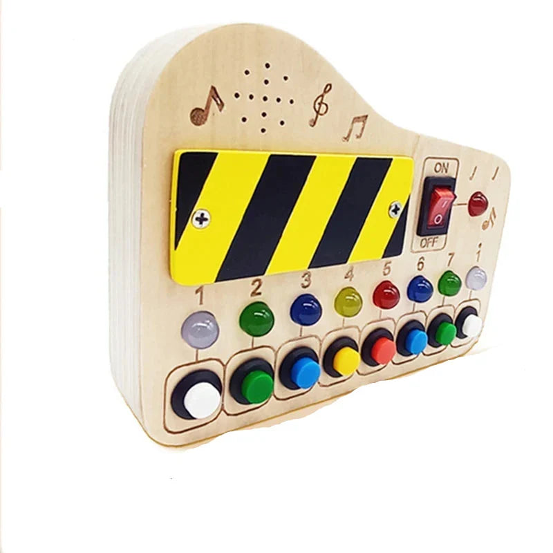 Children's TinkerBoard with various textures and shapes, encouraging exploratory play.