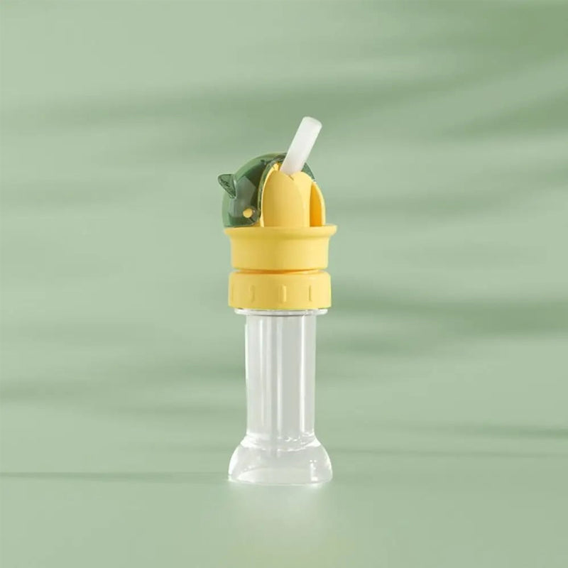 Detail shot of the silicone straw on a children's water bottle lid, for gentle hydration.