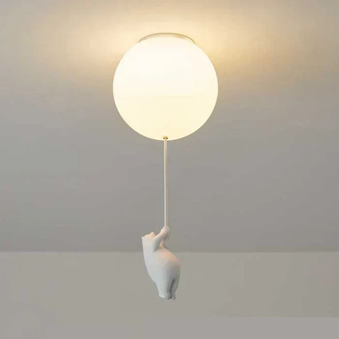 Whimsical bear & balloon ceiling lamp providing soft LED lighting, creating a cozy and inviting child's room.