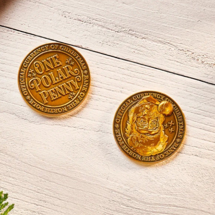 Assortment of Christmas collectible pennies and a velvet carrying pouch, perfect for North Pole fans