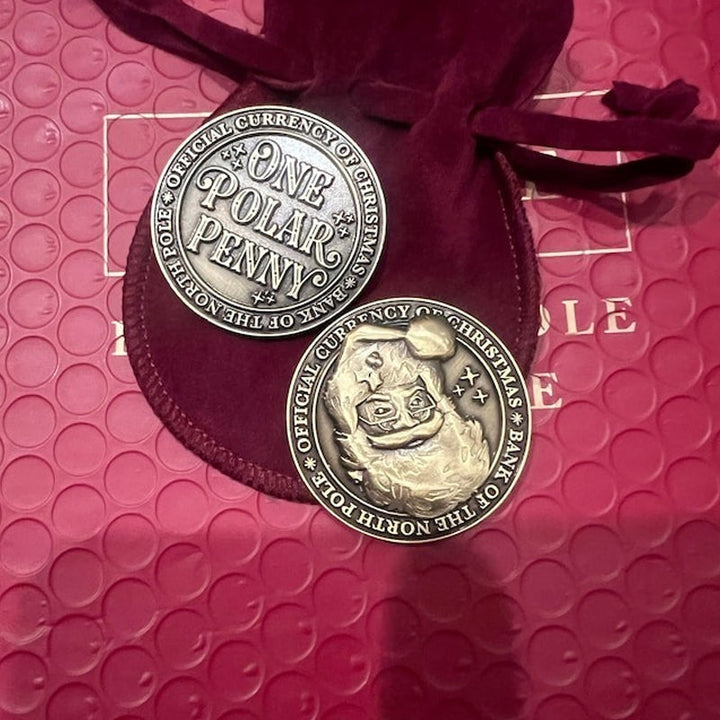 Collectible Polar Pennies for Christmas, presented in a velvet pouch for safekeeping or gifting