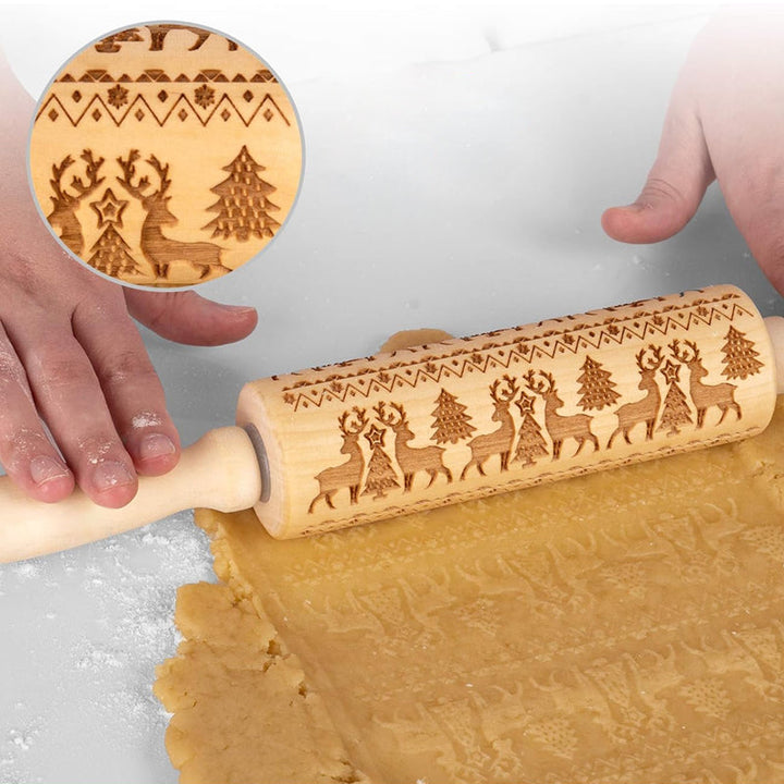 Embossed wooden rolling pin featuring festive Christmas patterns for baking fun.