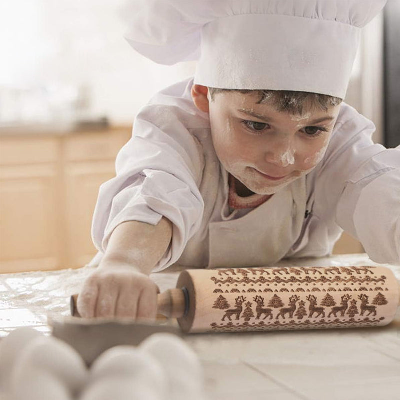 Wooden rolling pin with charming Christmas patterns, a great gift for bakers.