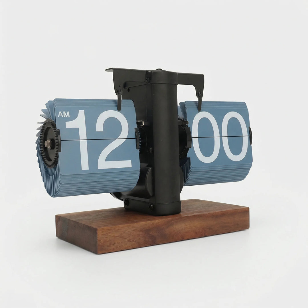 Classic black flip desk clock with white numerals, vintage mechanical display for home office decor.