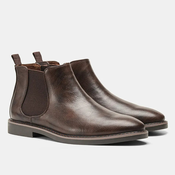 Versatile men's black Chelsea boots, sleek silhouette, providing all-day comfort and effortless style.