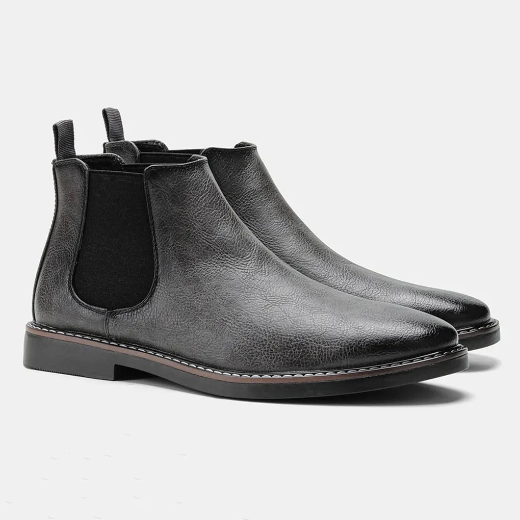 Men's tan leather Chelsea boots, slip-on design, perfect for adding a touch of casual elegance.
