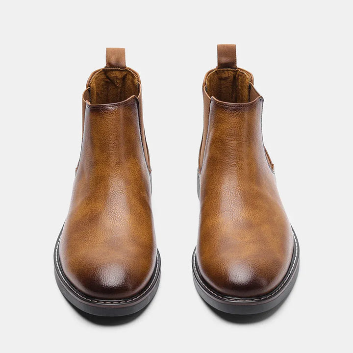 Men's durable black Chelsea boots, high-quality material for long-lasting wear & sophisticated style.