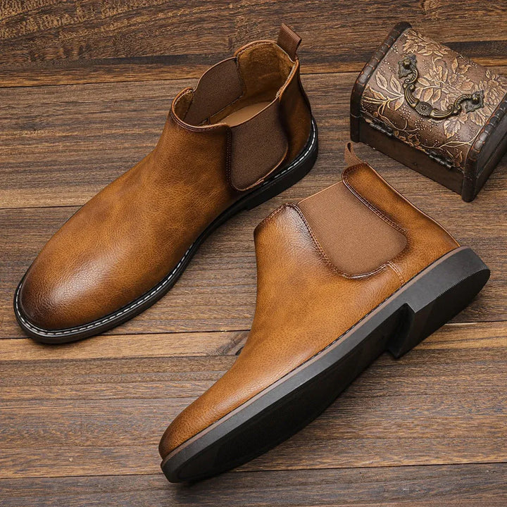 Effortless black men's Chelsea boots, premium leather, offering all-day comfort and versatile style.