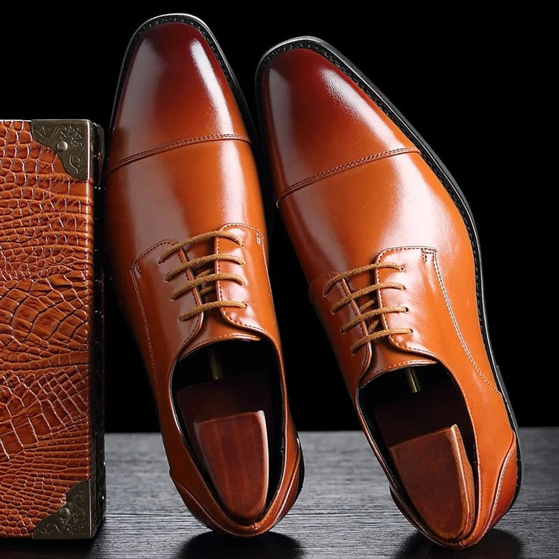 Classic black men's Oxford dress shoes. Elegant formal footwear for business meetings & sophisticated style.