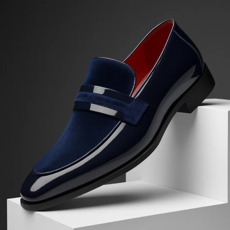 Classic black men's slip-on penny loafers, perfect for everyday casual or dressy style. Comfortable & versatile.