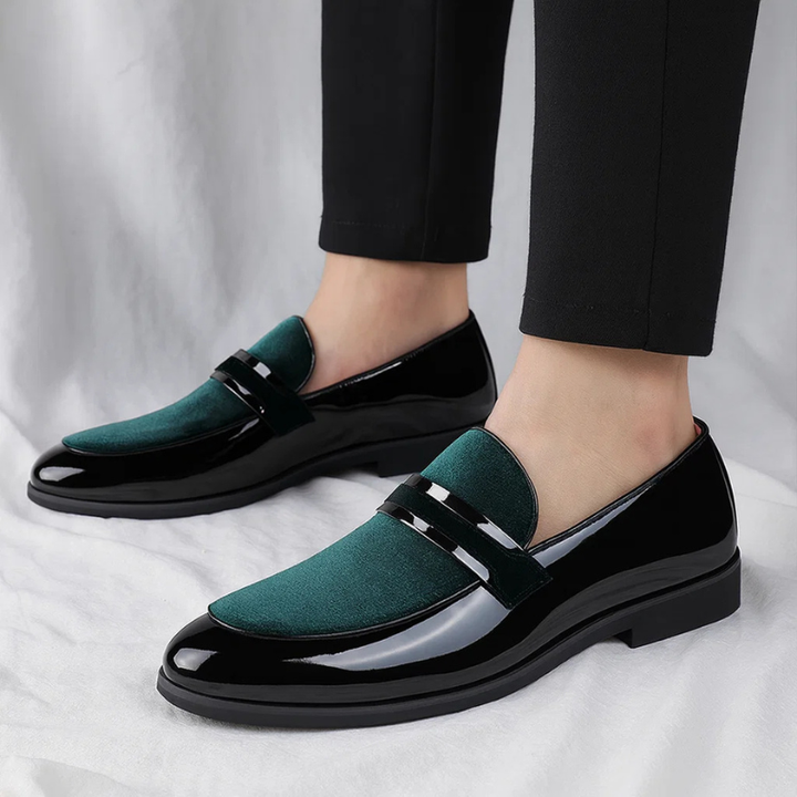 Tan men's slip-on penny loafers, a classic choice for comfortable everyday casual and semi-formal outfits.