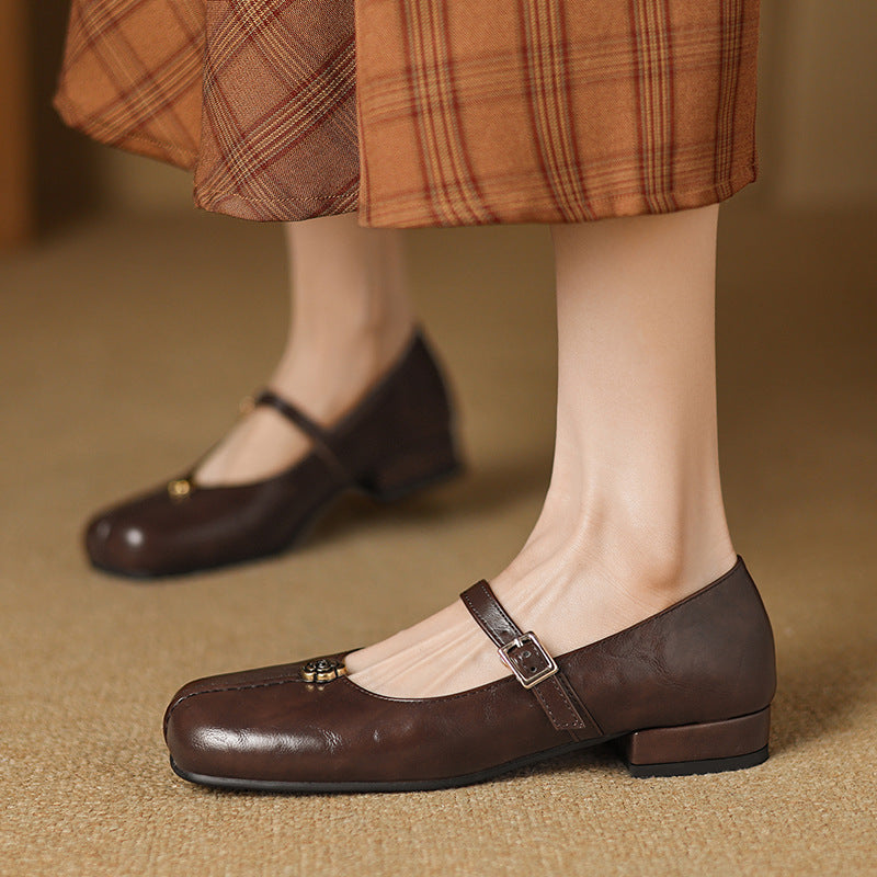 Stylish black women's ballet flats with strap, offering comfort and versatility for daily outfits
