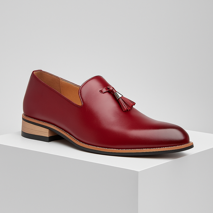 Comfortable mens loafers with double tassels, shown in a rich chocolate brown leather.