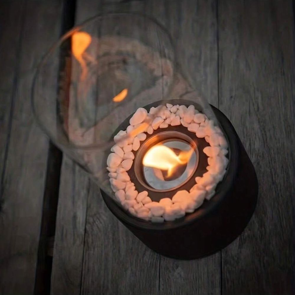 Elegant oil lamp, metal and glass construction, classic design for stylish ambient lighting.
