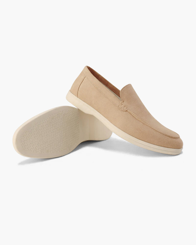 Dress up or down with men's classic slip-on loafers. Enhanced comfort insole for versatile styling.