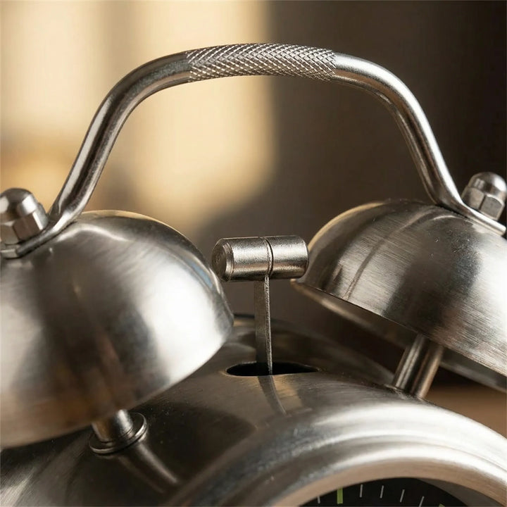 Retro twin bell alarm clock featuring a classic design, silent operation, and a loud alarm for heavy sleepers.