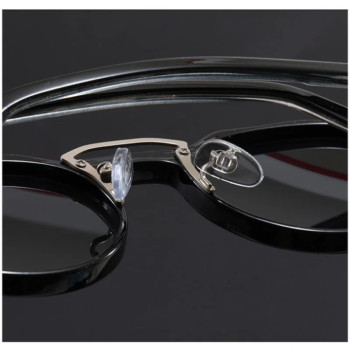 A pair of modern vintage round unisex sunglasses with advanced UV400 protection, light and trendy.