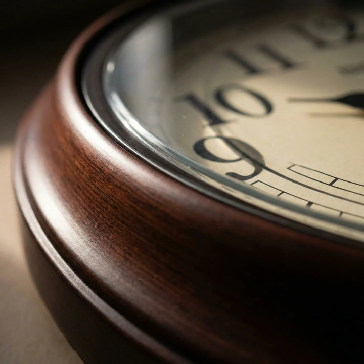 Decorative classic round wall clock, traditional style, perfect accent for living room, study, or office wall.