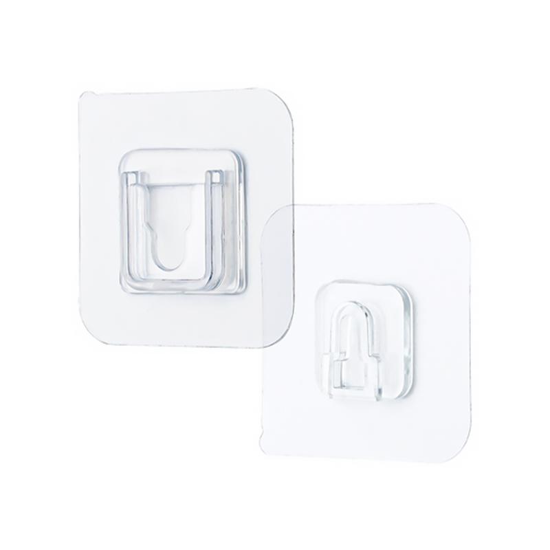 Reusable transparent adhesive hooks for kitchen storage, strong hold on smooth surfaces, easy removal