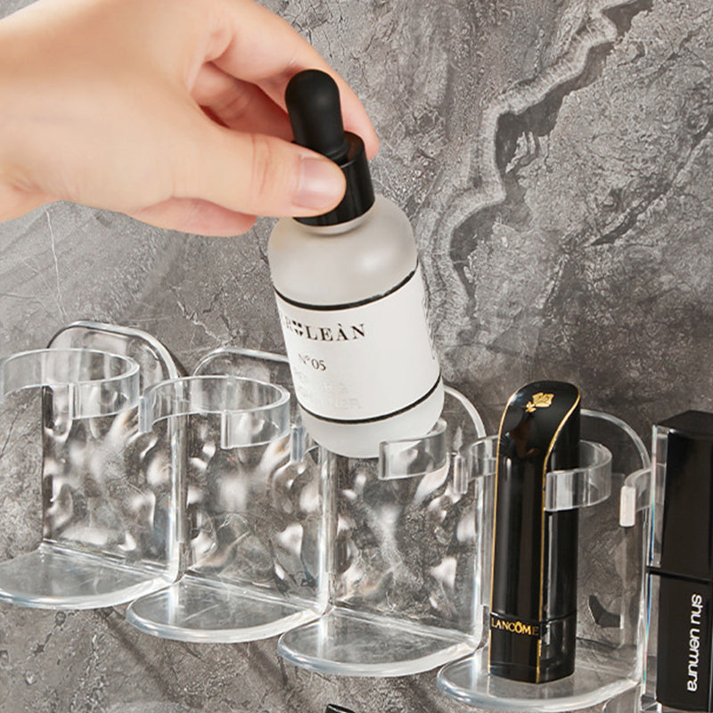 Side view of the clear multi-hook wall storage rack, emphasizing its sleek, space-saving design.