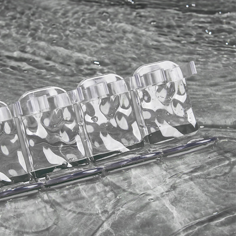 Packaging of the clear multi-hook wall storage rack, detailing its no-drill features.