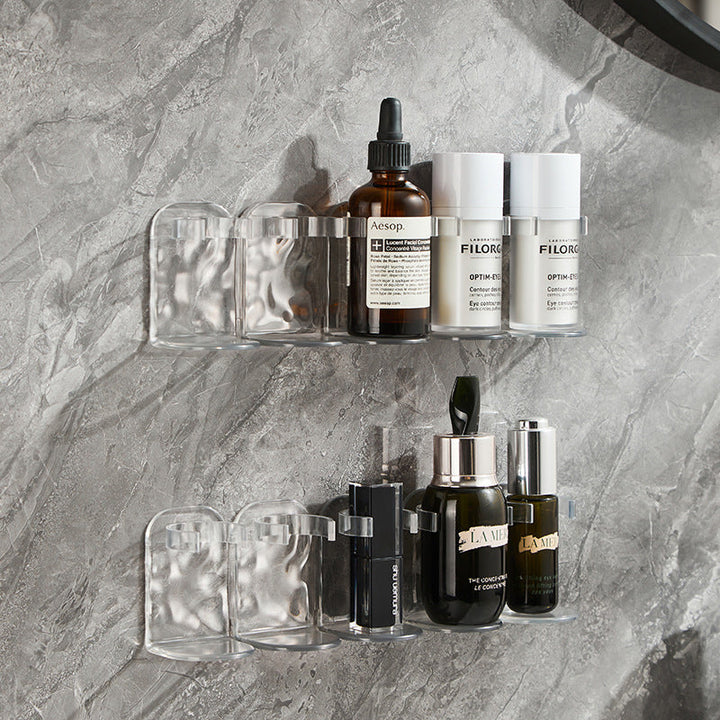 Close-up of clear multi-hook wall storage rack, highlighting the durable plastic and hooks.