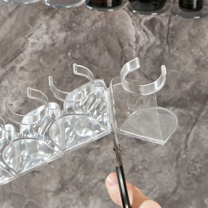 Clear multi-hook rack mounted on tile wall, showcasing its no-drill, easy installation.