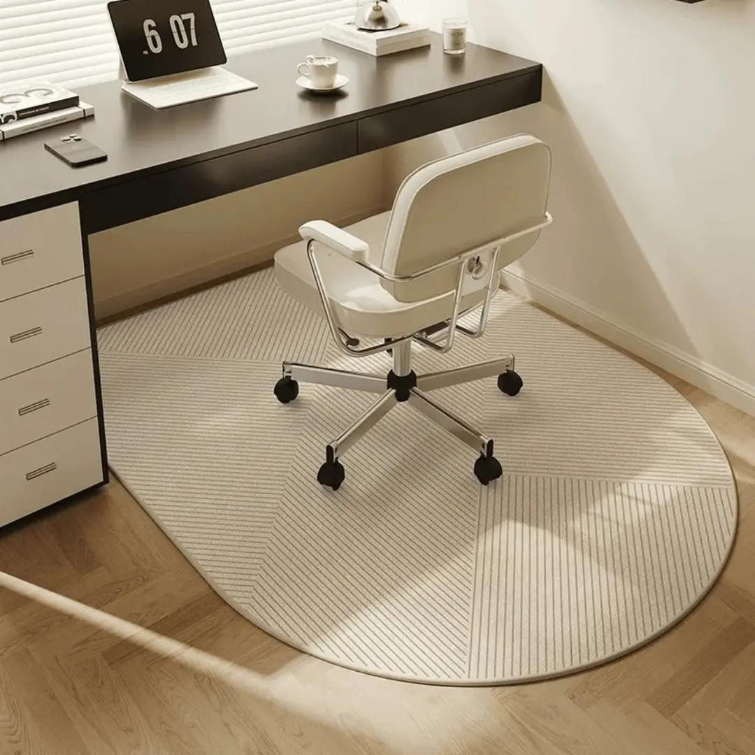 Transparent floor protector for office chairs, preventing scratches on wood or tile floors in a home office.