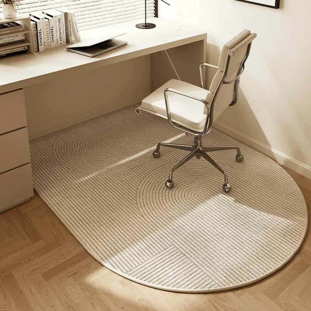 Ergonomic clear chair mat for a workspace, designed for smooth movement of rolling office chairs over carpet.