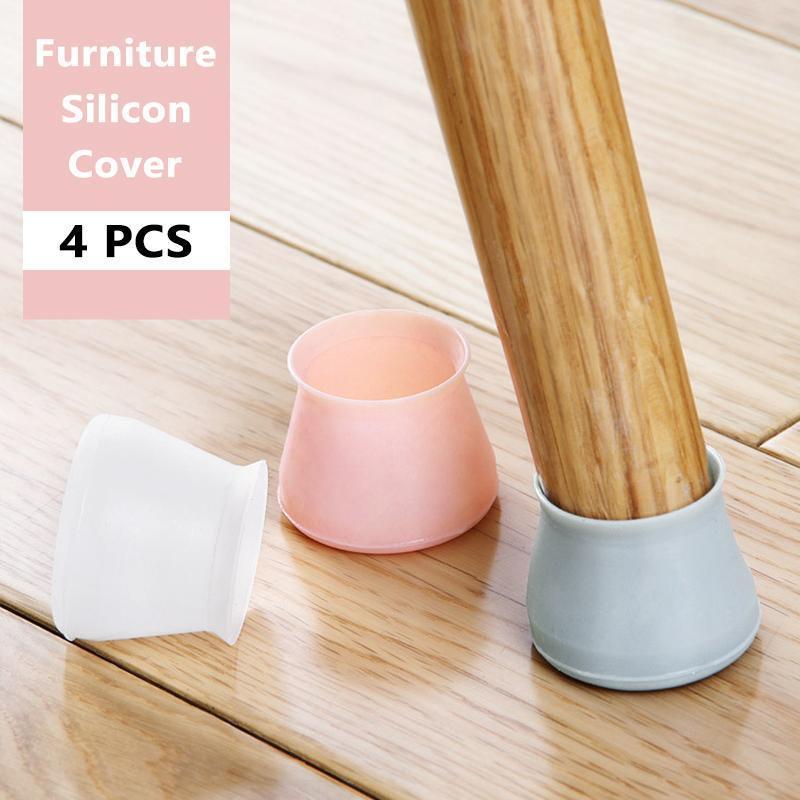 Clear silicone chair leg protector for furniture on a hardwood floor, preventing scratches and reducing noise.