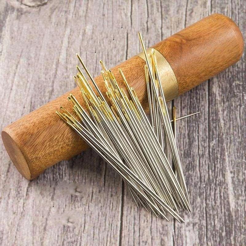 Detail view of the specialized eye on a self-threading needle, simplifying thread insertion