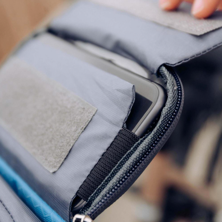 Secure bike handlebar bag in action, carrying phone and small items for daily commutes.