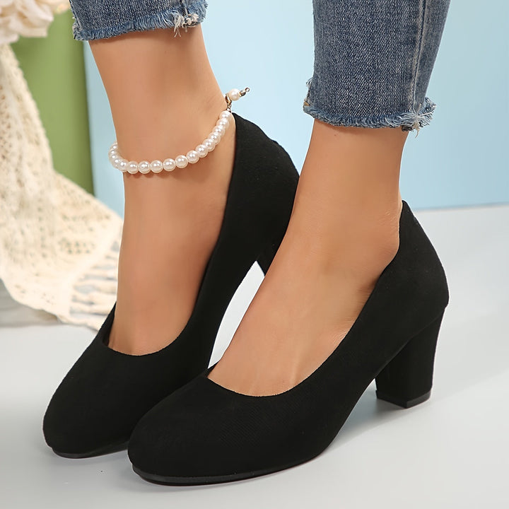 Pair of women's stylish comfort heels, ideal for formal or office wear, with stable heel & ergonomic design.